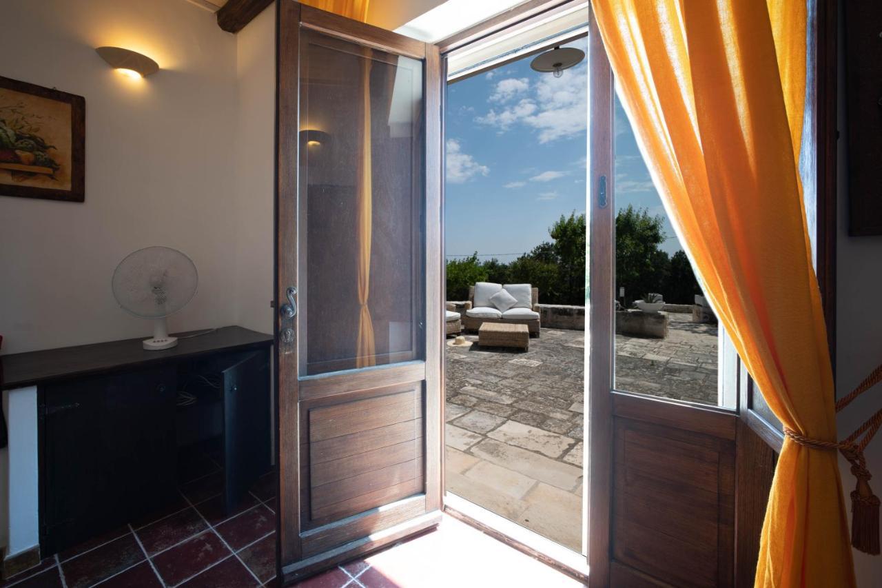 Вилла Wepuglia - Trullo Sentimento Мартина-Франка Экстерьер фото